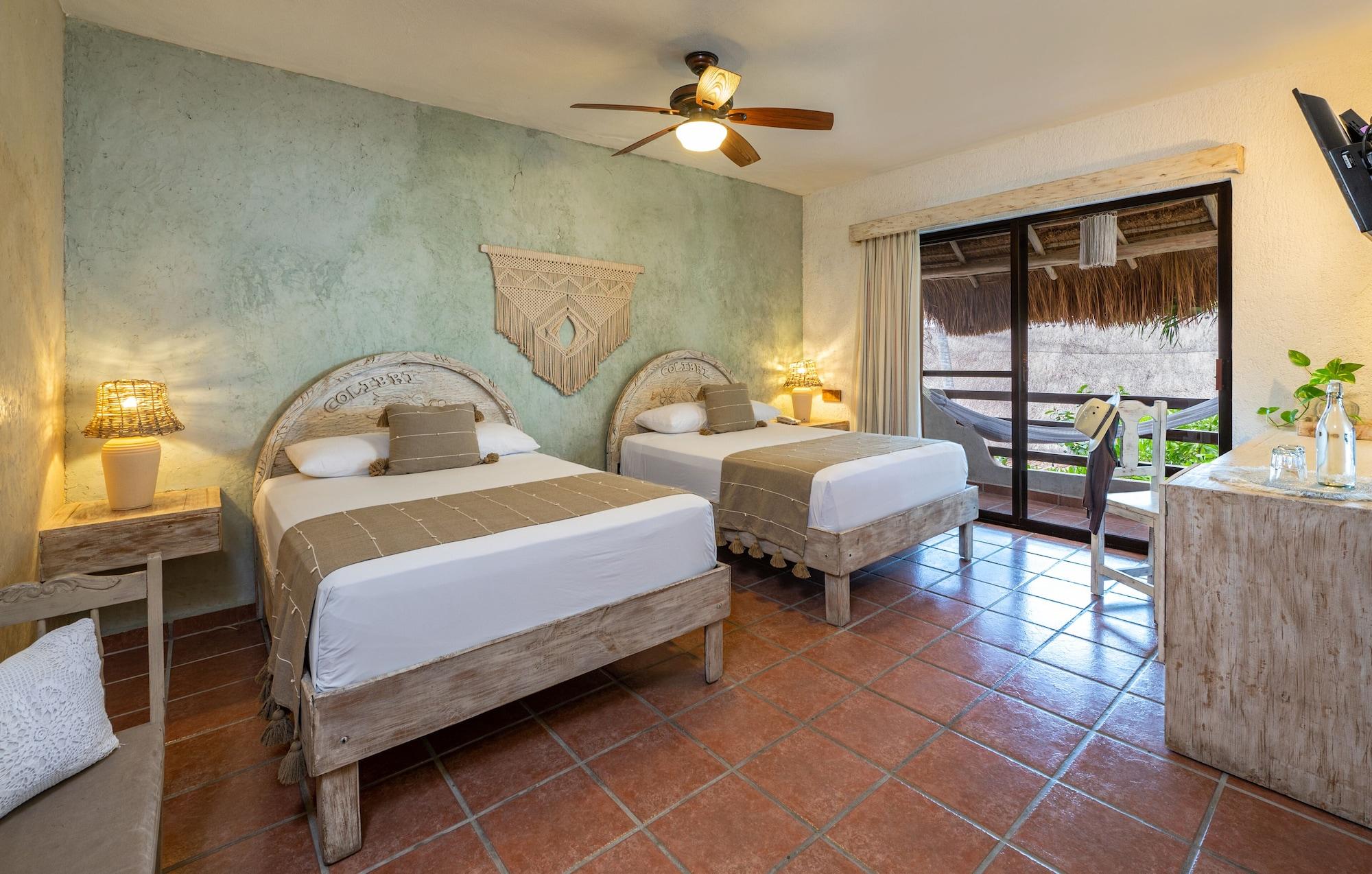 Hotel Casa Colibri Плая дел Кармен Екстериор снимка