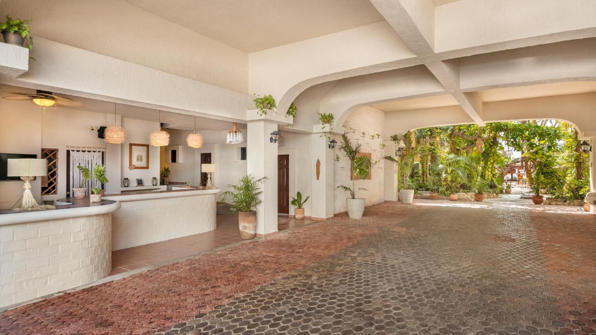 Hotel Casa Colibri Плая дел Кармен Екстериор снимка