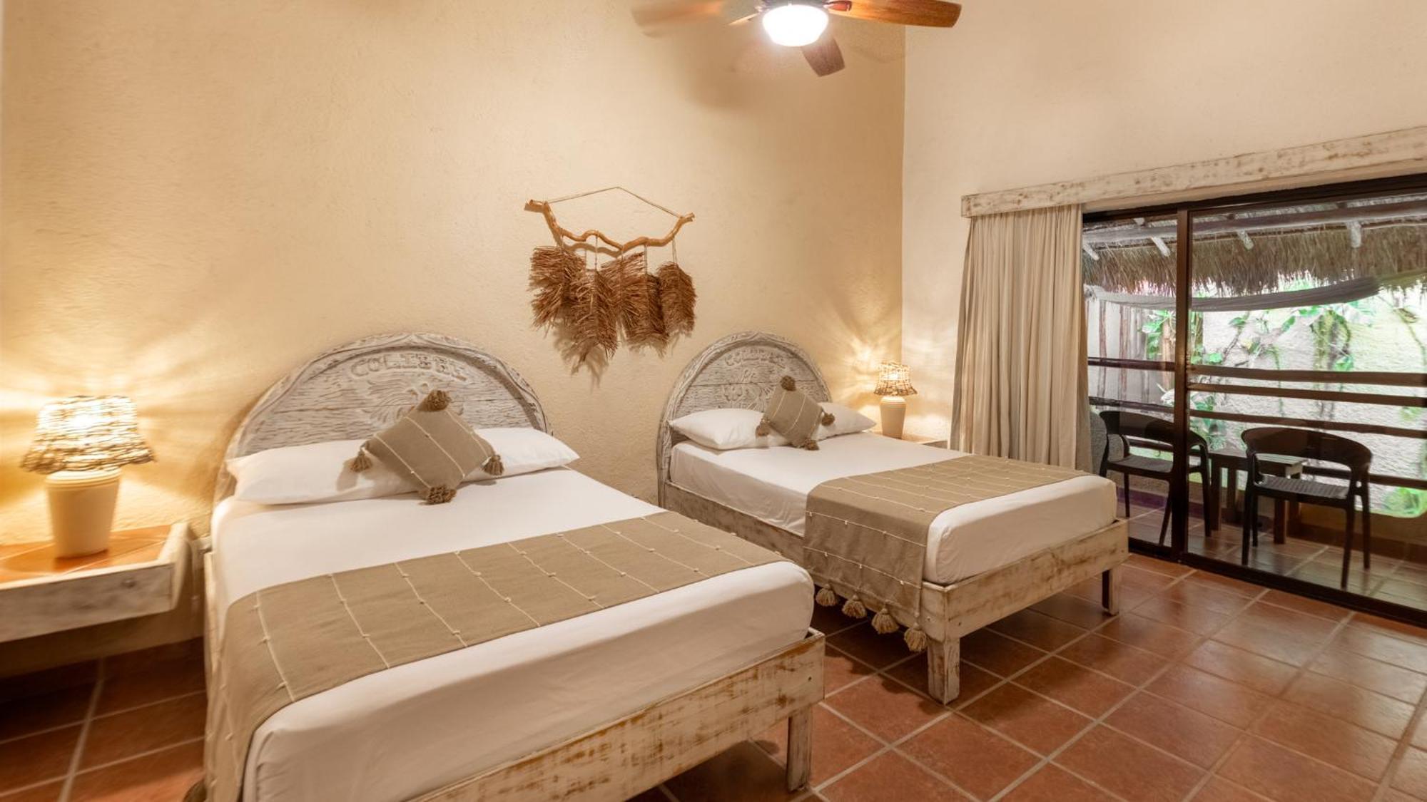 Hotel Casa Colibri Плая дел Кармен Екстериор снимка