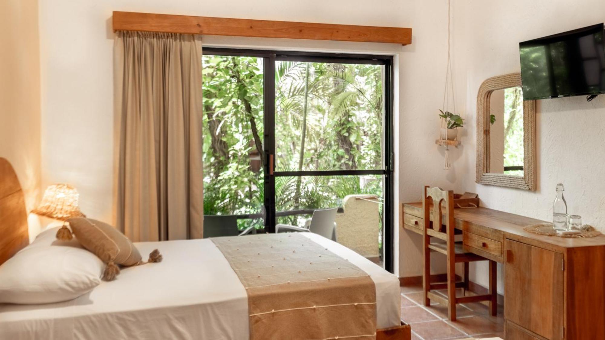 Hotel Casa Colibri Плая дел Кармен Екстериор снимка